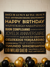TOILE BACKDROP AVEC SUPPORT ANNIVERSAIRE MULTILANGUE 2X2M NOIR-OR - Photo 1